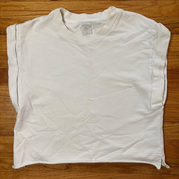 CALIA by Carrie Underwood Tops - CALIA Athleisure White Extended Shoulder Cuffed Sleeveless Top